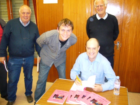 Members line up for signed copies