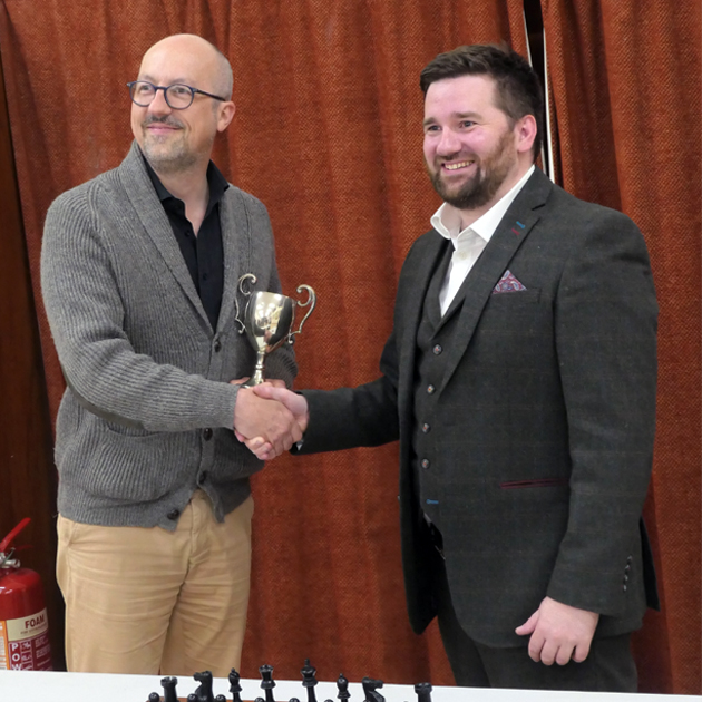 New secretary awards trophy for best league performance
