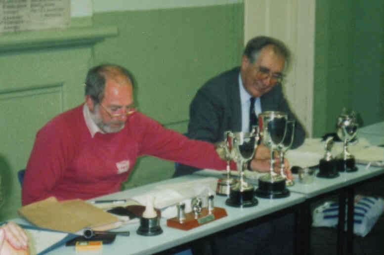 President Roger Nall and Secretary Ken Burrows officiate at an early 1990s AGM