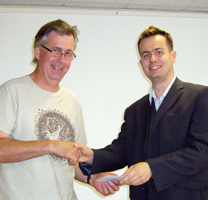 Giles Stanton receives his prize