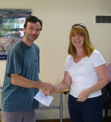 Stephen Katona (left) receives his first prize in the Intermediate