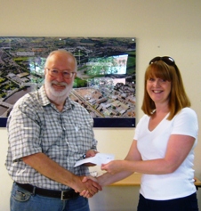 Andrew Price receives his shared second prize in the Major