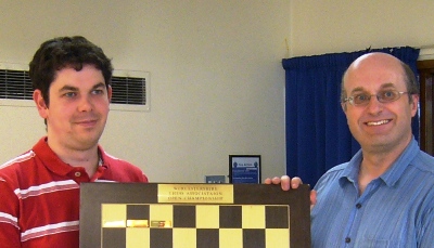 Richard Jones receives the Worcestershire Open Trophy from Andrew Farthing