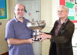 Andrew Farthing  receives the Bonham Rose Bowl Division One trophy from President Peter kitson for Worcester City.